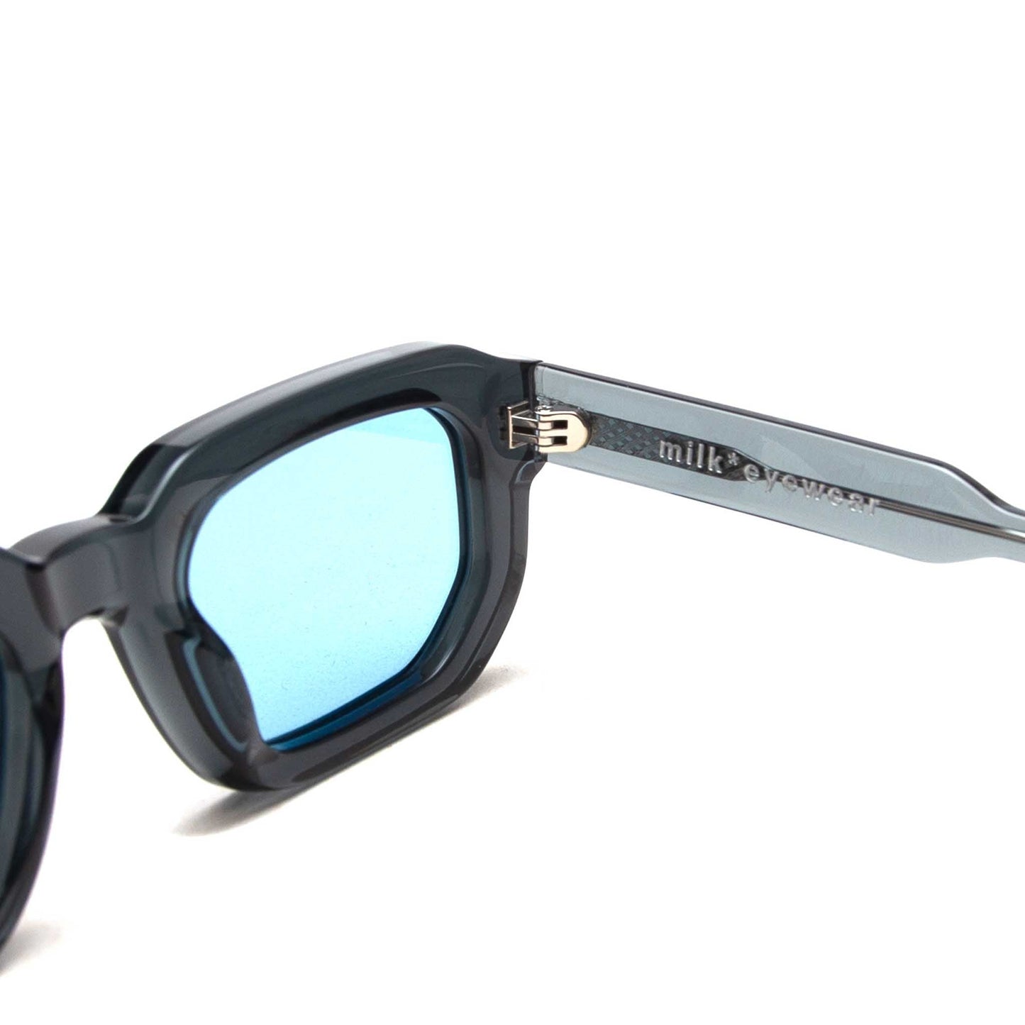 milk* eyewear Jules Sunglasses - translucent Grey, Blue lens. - milk* eyewear