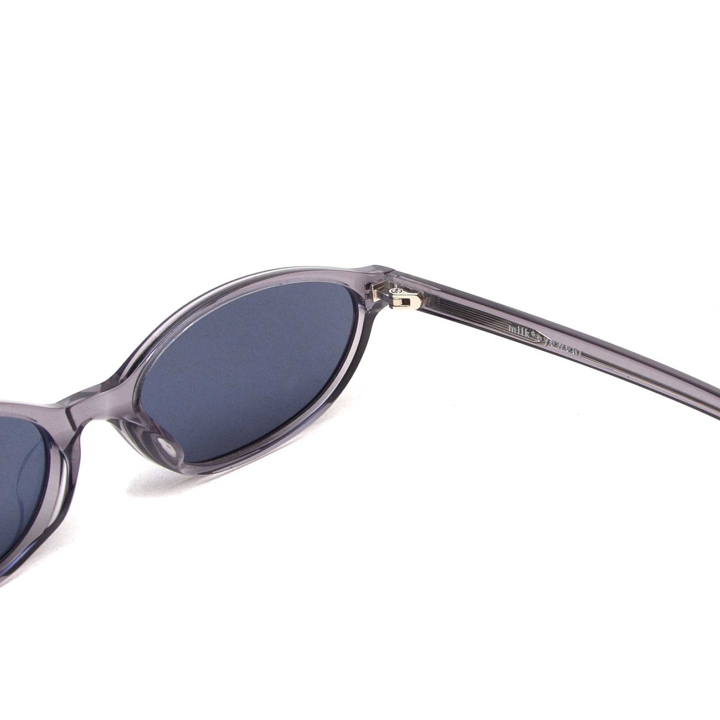 milk* eyewear Mia Sunglasses - translucent Grey, Grey lens. - milk* eyewear